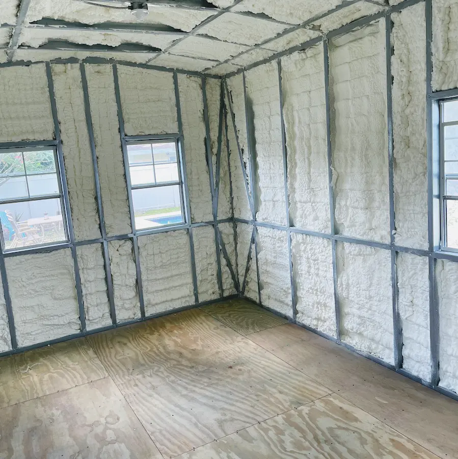Closed-cell spray foam insulation applied to wall cavities in a residential project in Coconut Creek